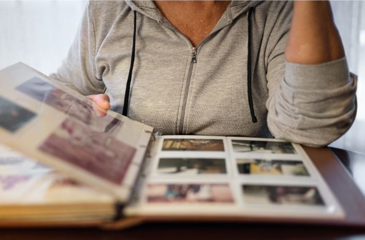 woman viewing photo album